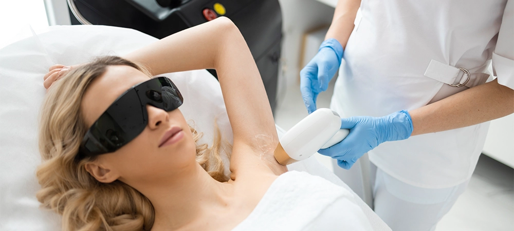 girl getting laser hair removal treatment
